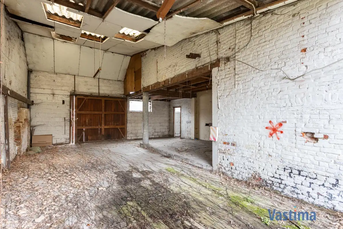 Unieke bouwgrond in het hart van Merchtem foto 11