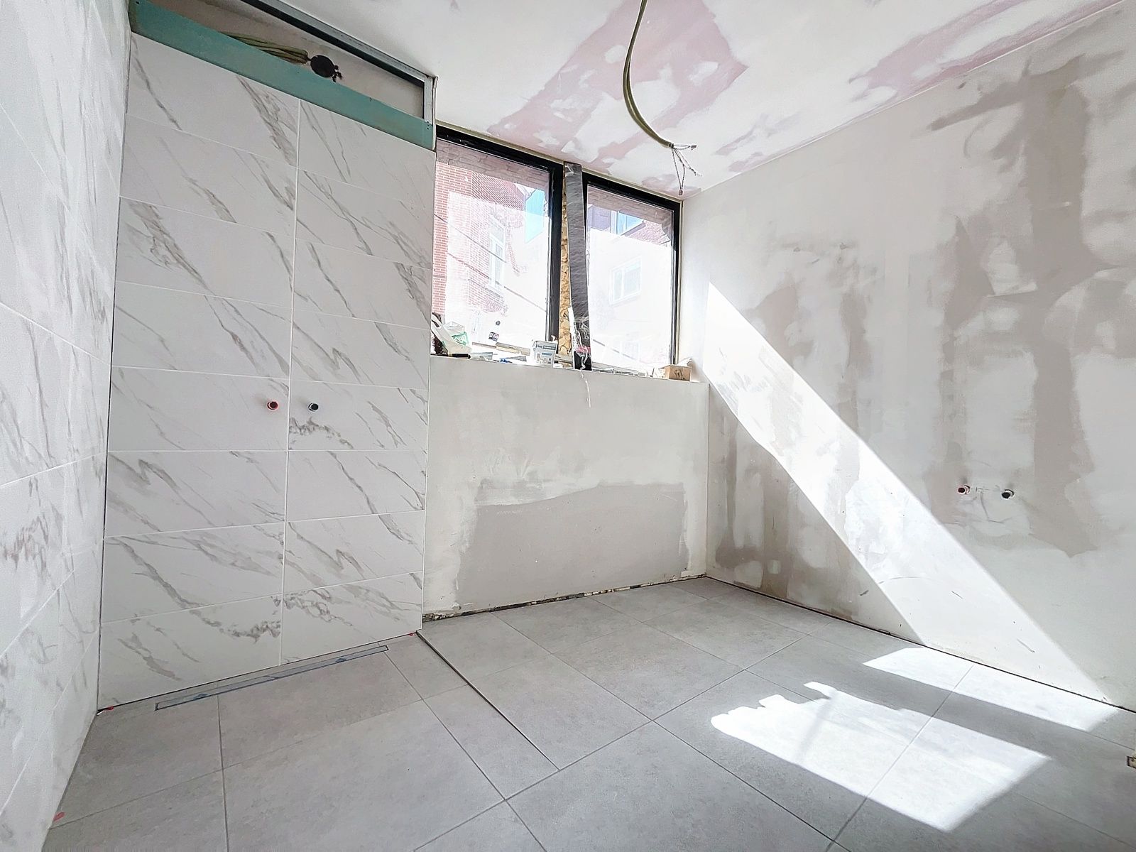 Gelijkvloers appartement met 2 slpks en terras nabij centrum foto 9