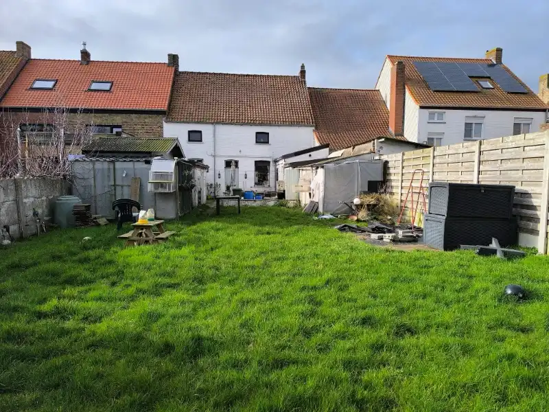 Rijwoning met garage en tuin foto 2