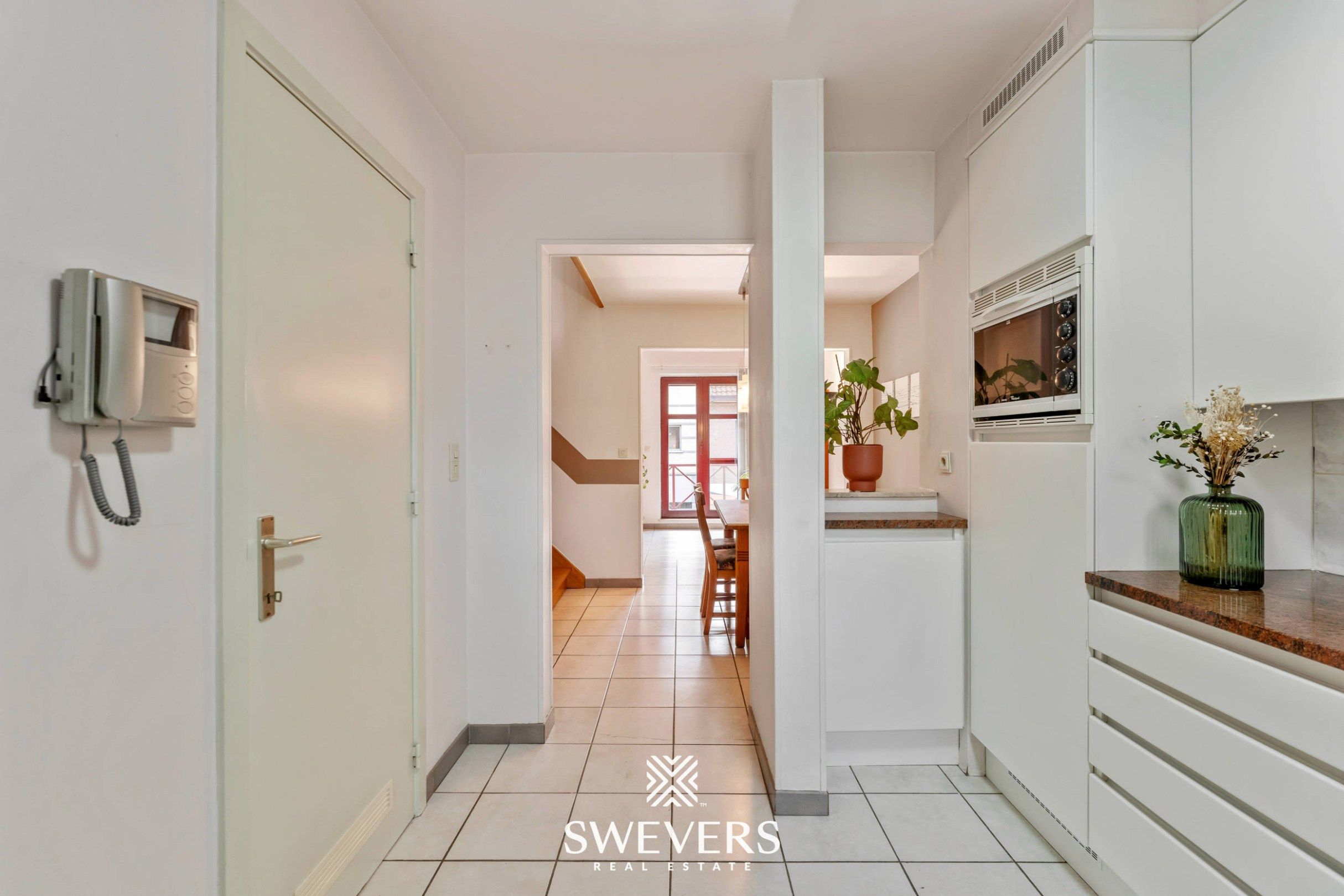 Instapklaar en lichtrijk duplexappartement in centrum Herk-de-Stad foto 17