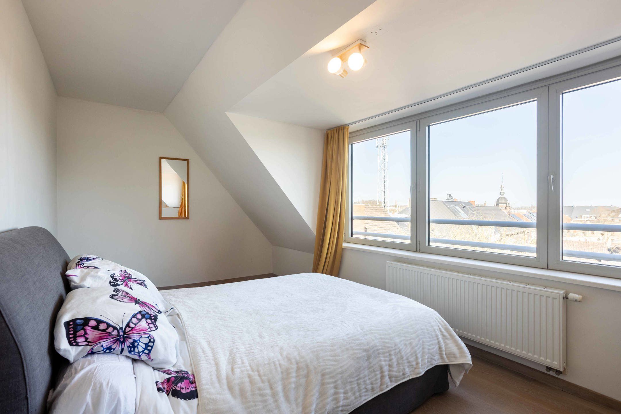 Ruim en lichtrijk 2-slpk appartement te koop met garagebox foto 10