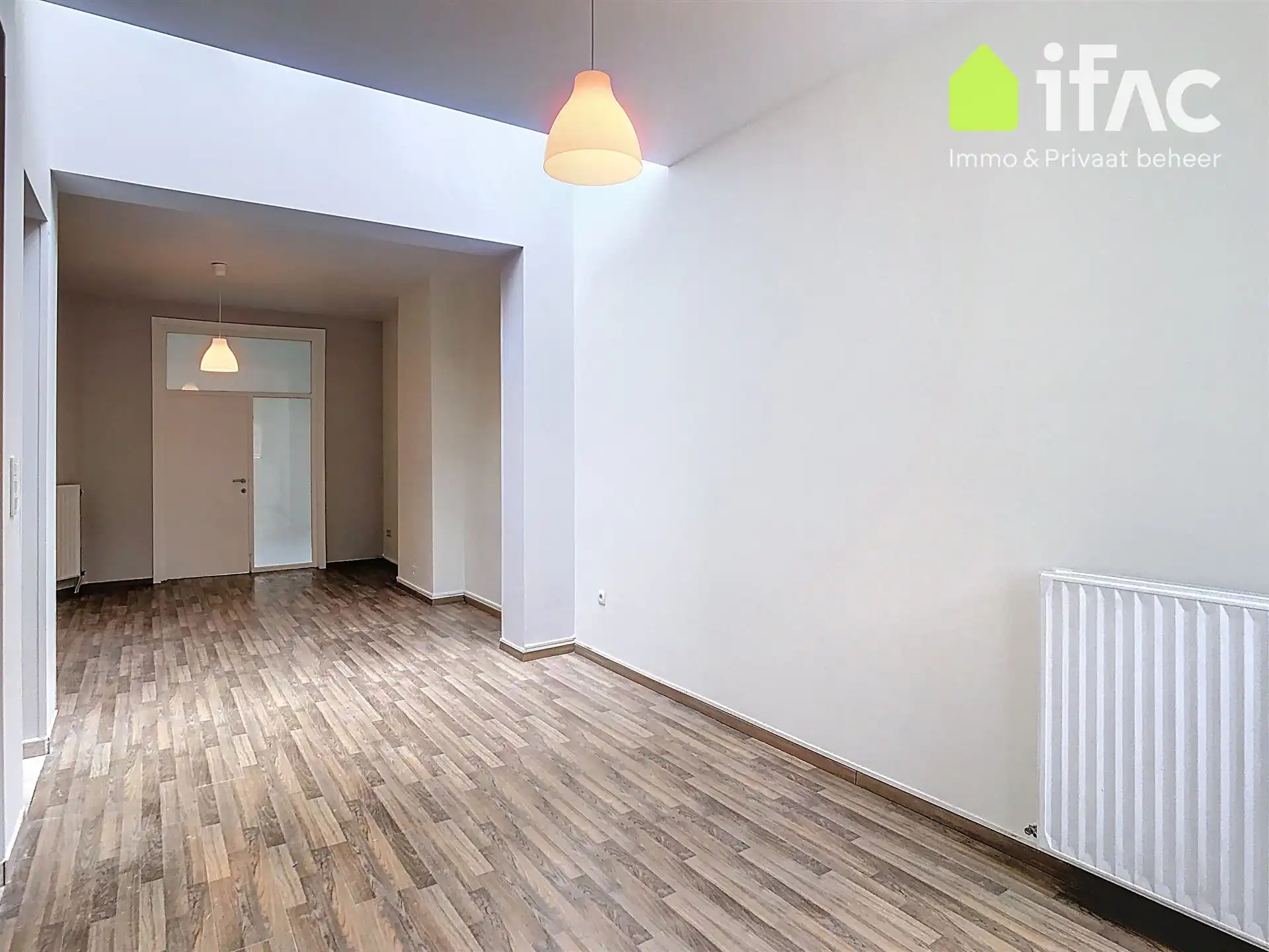 Ruim gelijkvloers appartement met tuin foto 3