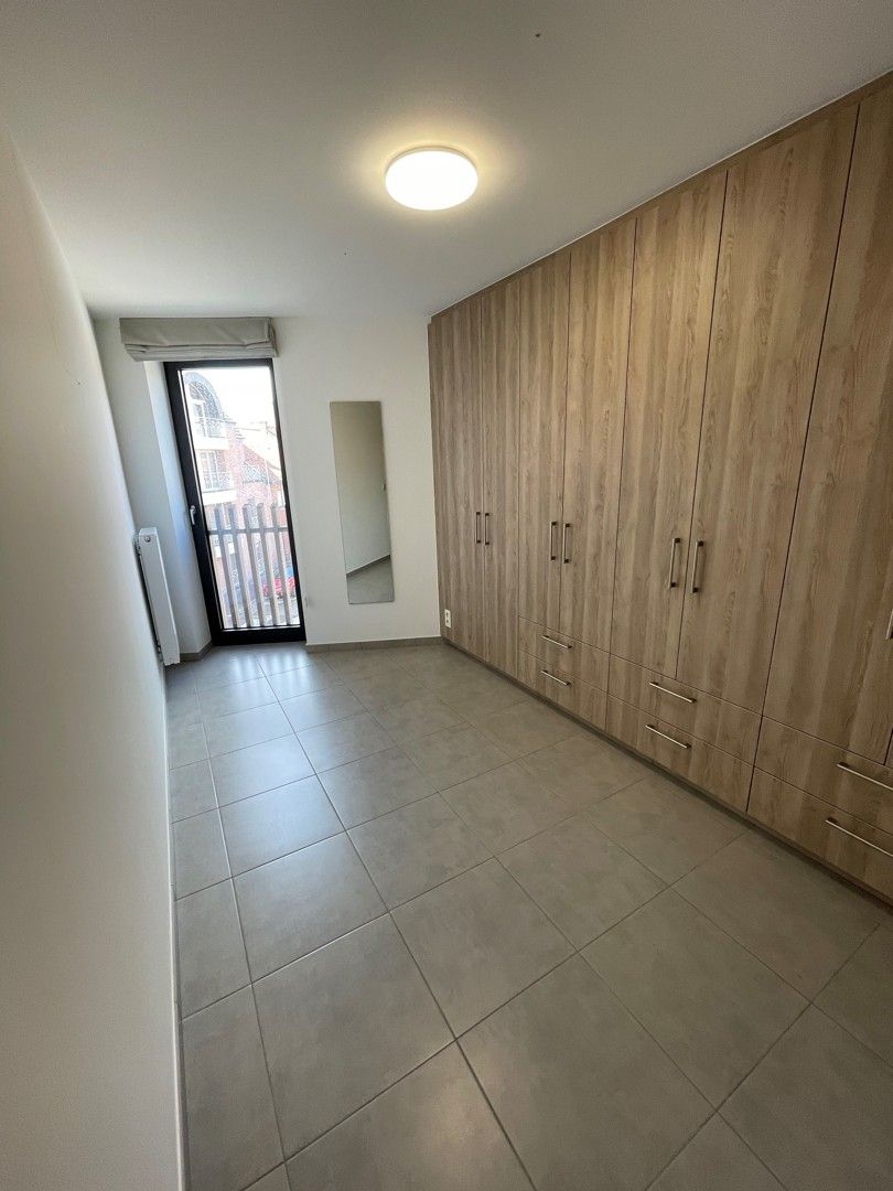 Mooi volledig instapklaar appartement met 2 slaapkamers en terras in het centrum van Diepenbeek. foto 15