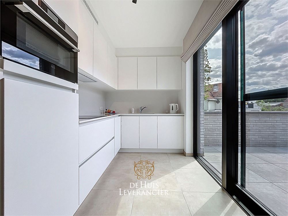 Discrete luxe & tijdloze elegantie : subliem nieuwbouwappartement met terras en gemeenschappelijk tuin te koop in Boechout foto 23