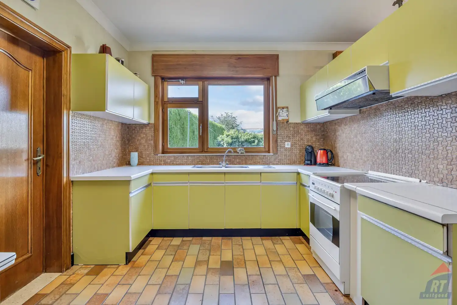 Rustig gelegen halfopen bebouwing met ruime tuin en tal van renovatiemogelijkheden foto 7