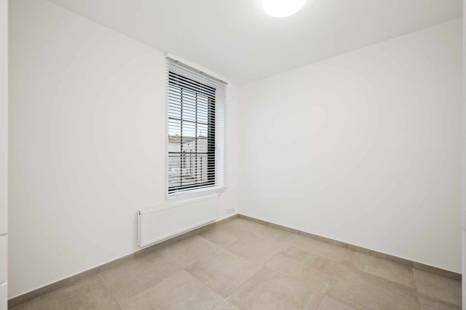 Zonnig nieuwbouw tuinappartement te ITEGEM foto 16