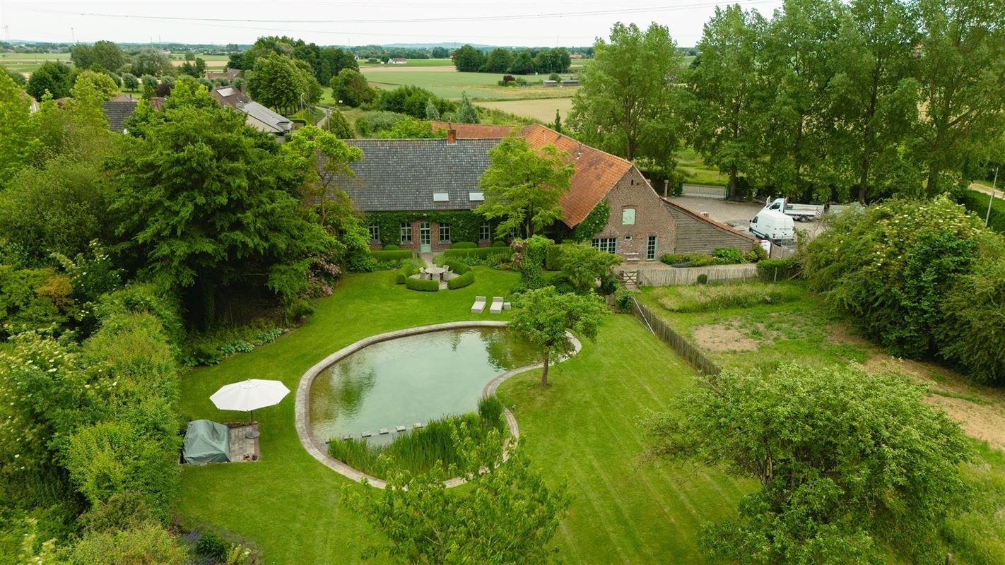 Charmante hoeve met loods en idyllische tuin te koop in Zwevegem foto 20