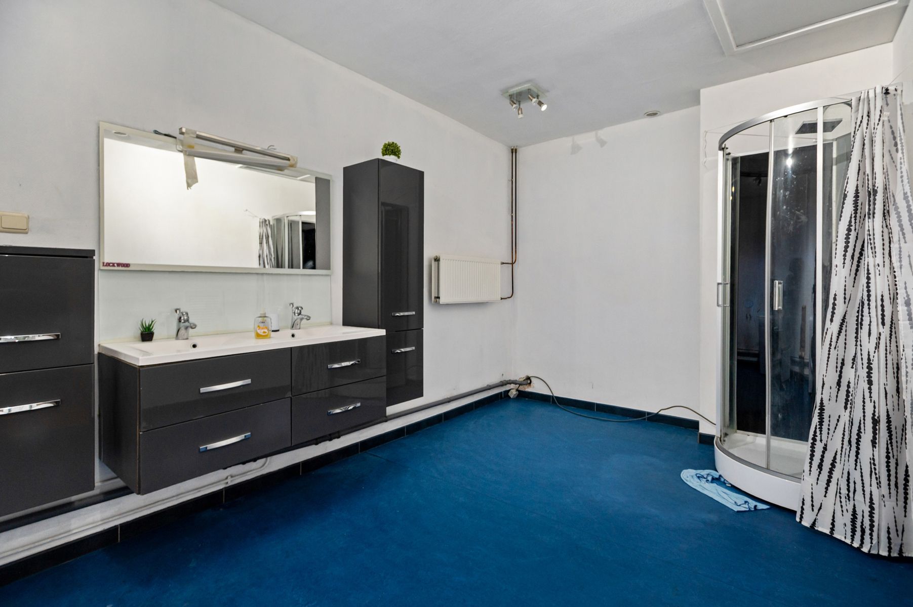 Handelshuis met tuin en stabiele huuropbrengst te koop foto 3