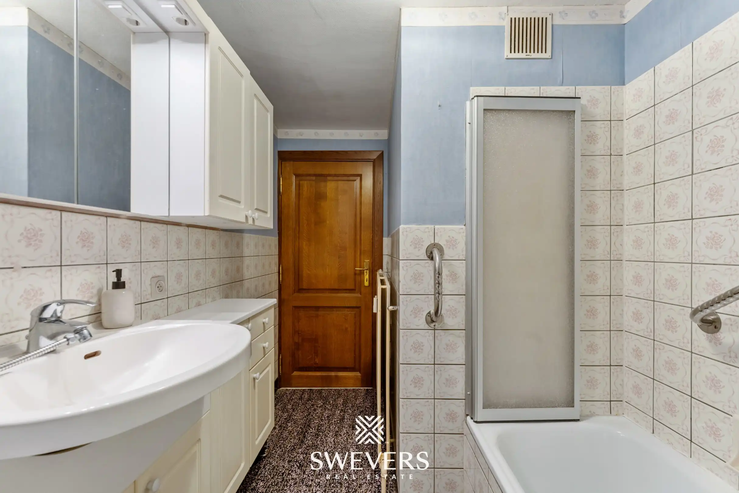 Ruim en lichtrijk 3-slpk appartement met 2 terrasjes in hartje Genk foto 14