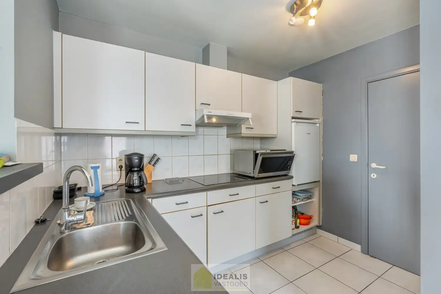 IDEALIS VASTGOED – Handelsruimte/showroom met 2 appartementen gelegen op een perceel van 6a 47ca op een commerciële zichtlocatie op het ‘Lindel’. foto 12
