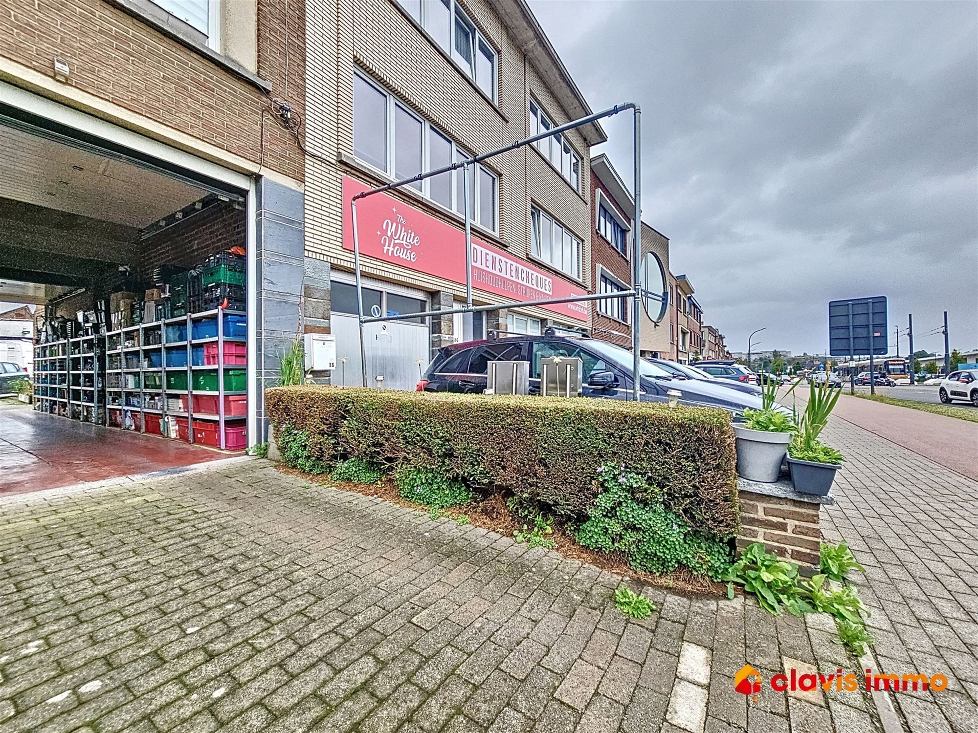 Opbrengsteigendom met 4 appartementen en een winkel foto 1