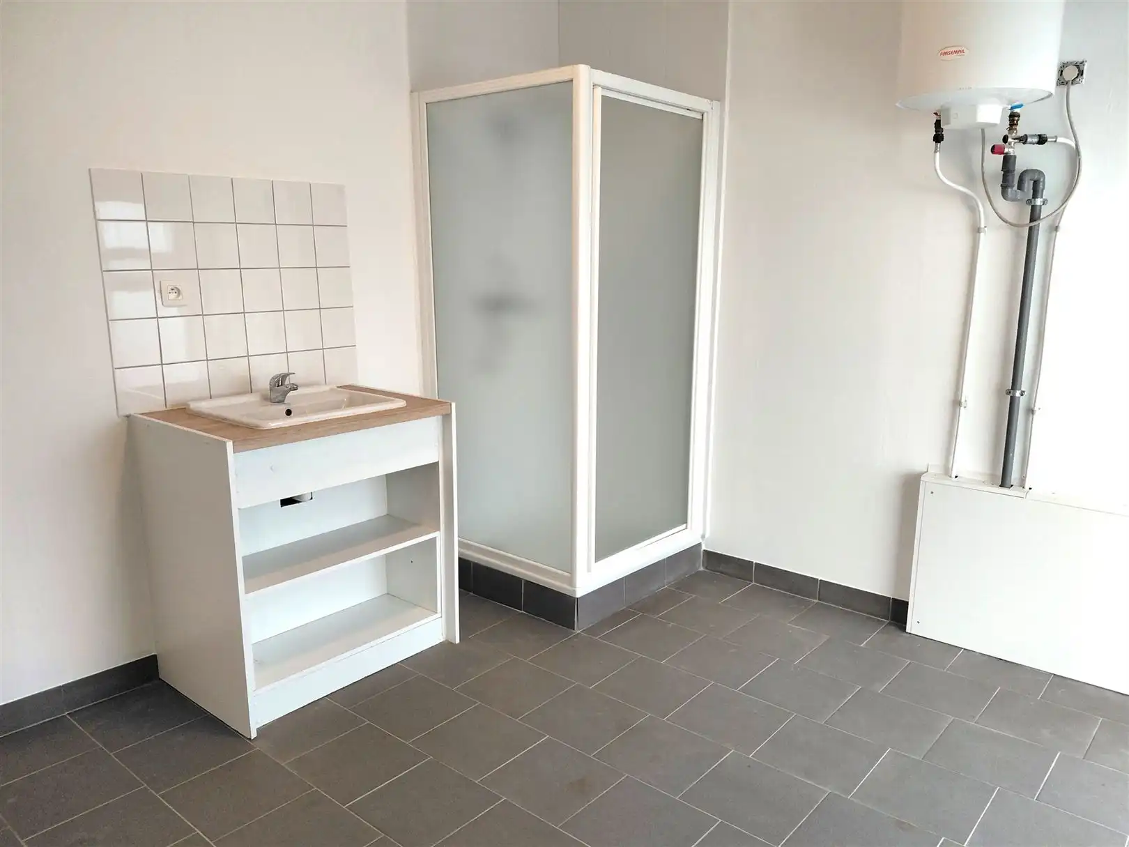 TE HUUR: Gesloten bebouwing met 2 slaapkamers in het centrum van Heusden! foto 9