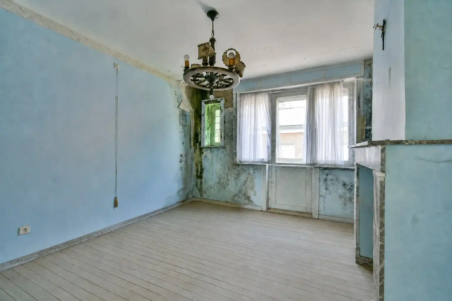 Woning met renovatiepotentieel in het hart van Ruddervoorde! foto 2