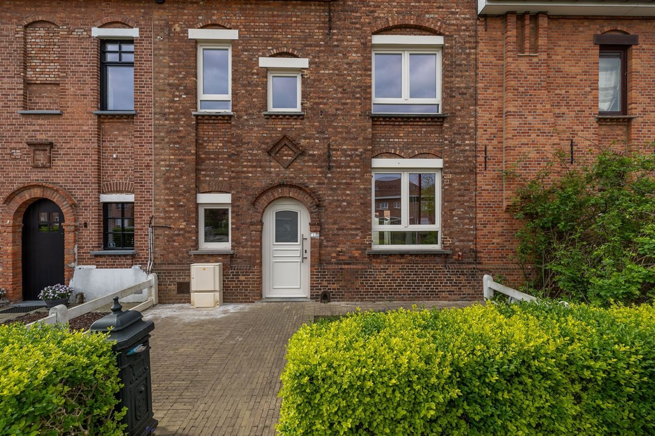Stadswoning met 3slk en tuintje op topligging foto 3