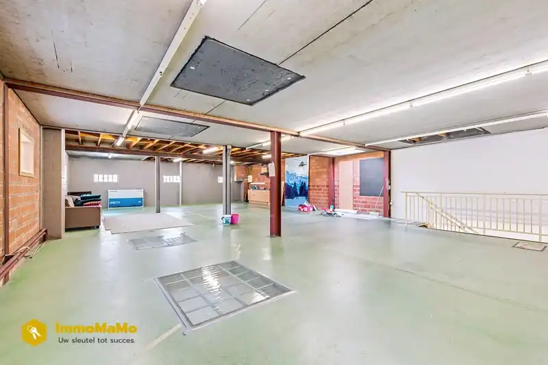 Ruime handelswoonst te koop in de dorpskern van Destelbergen foto 12