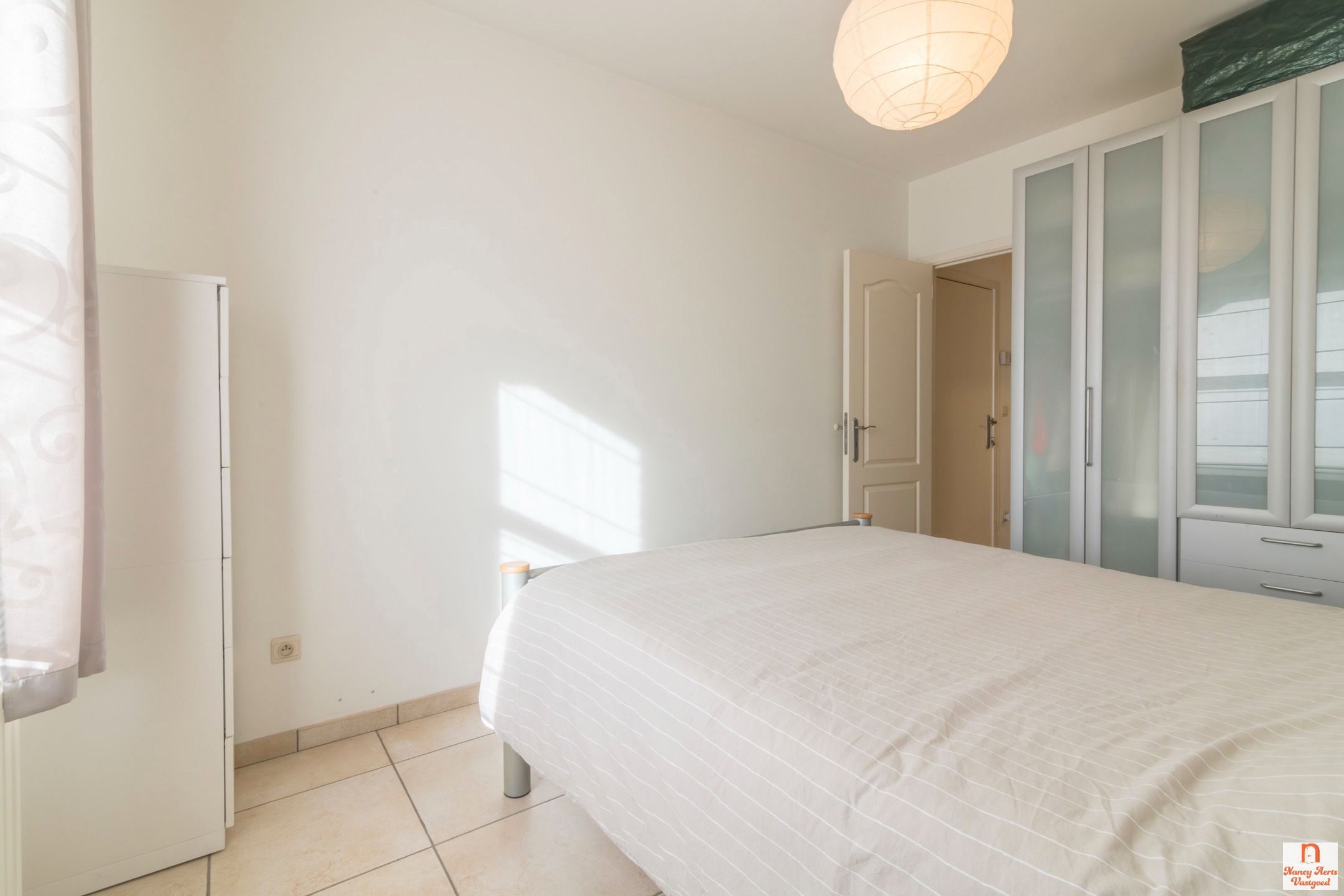 Lichtrijk gelijkvloers appartement met tuinzicht in Kuringen foto 13