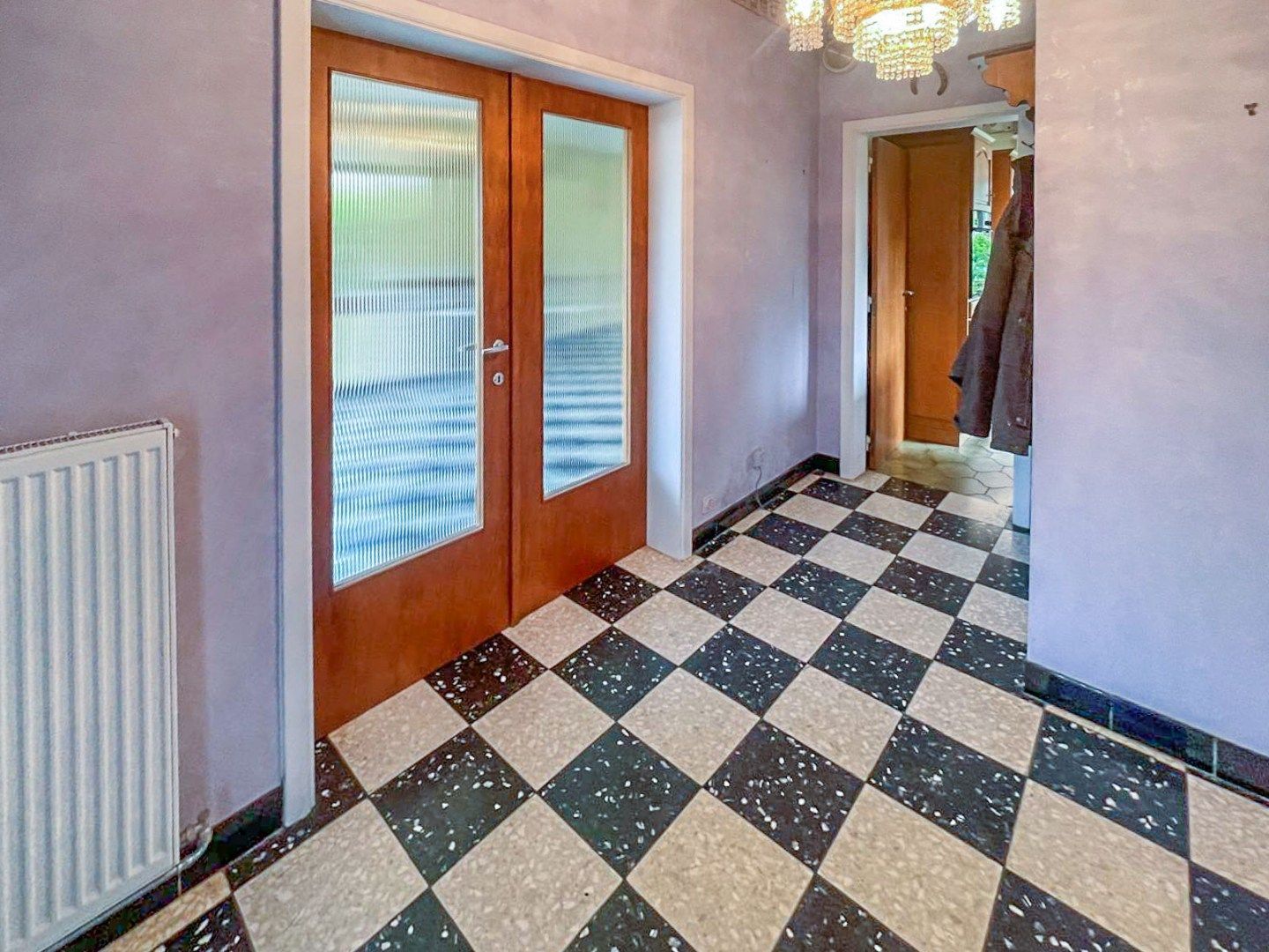 Te renoveren viergevelwoning met tuin foto 3
