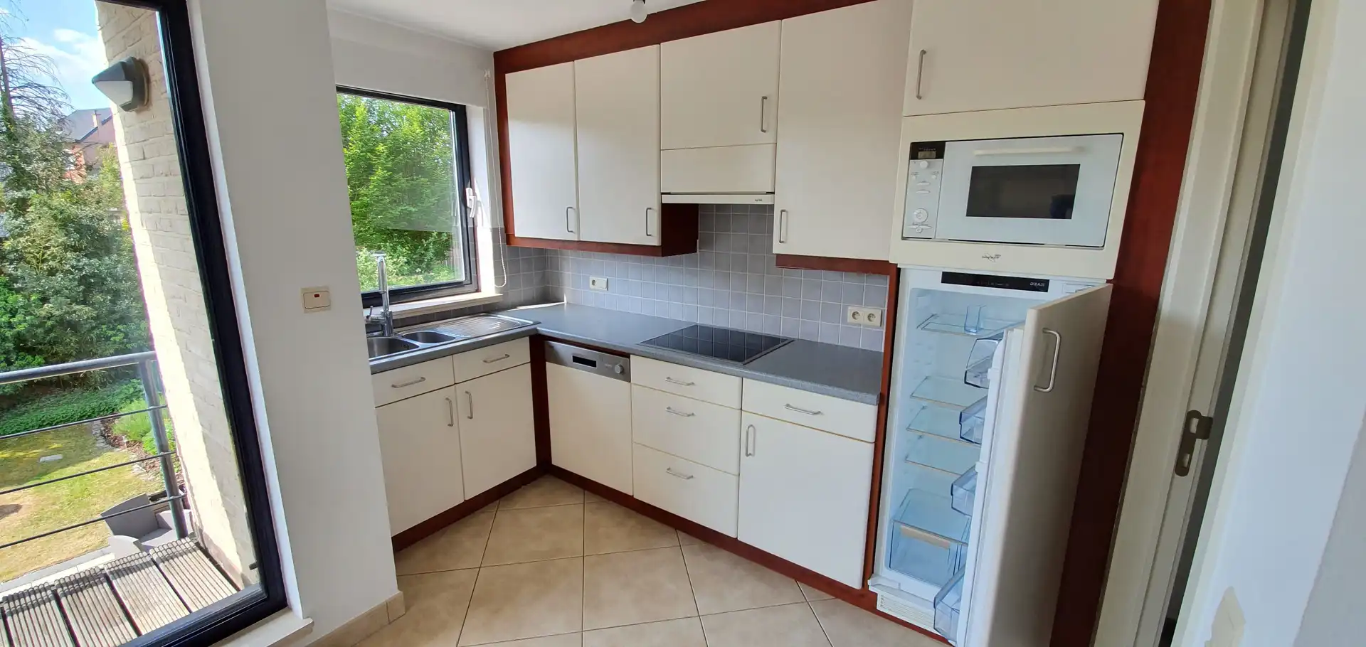 Rustig gelegen appartement met terras, garagebox en lift foto 4