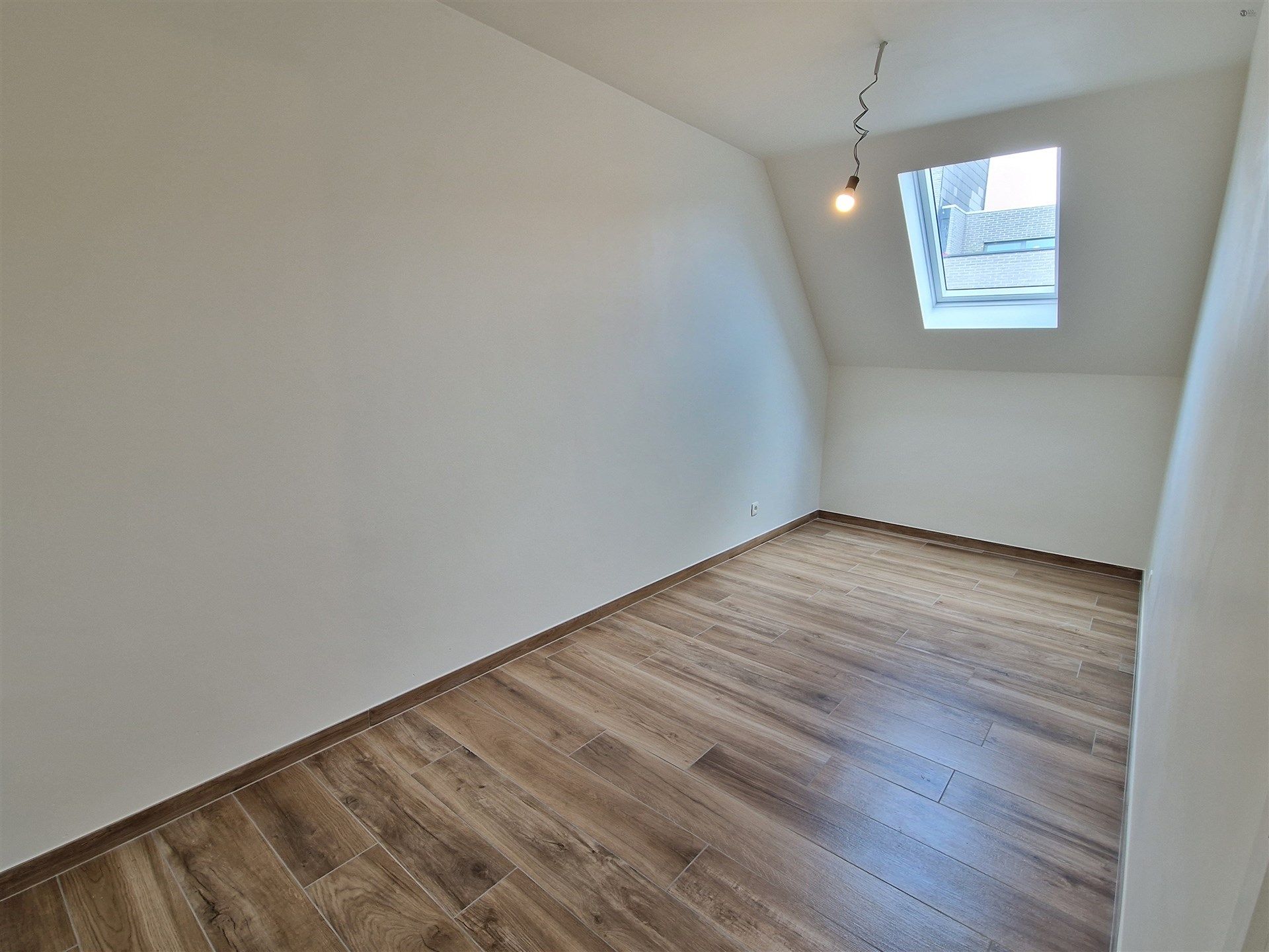 Uitzondelrijk duplex appartement met 2 slpkm en zolder. foto 14