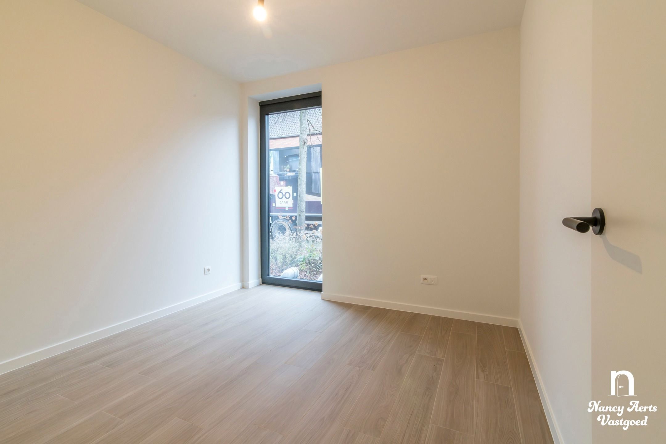 Nieuwbouwappartement met terras in het centrum van Beverlo foto 15