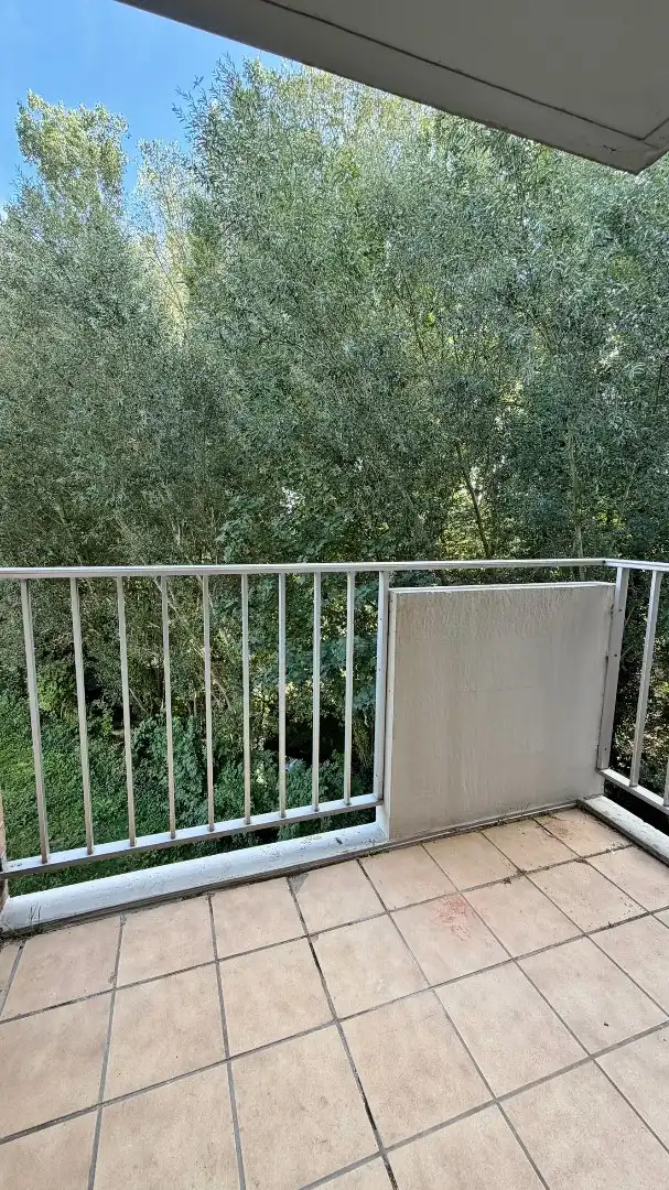 Ruim en lichtrijk appartement met garage, terras en open zicht foto 12