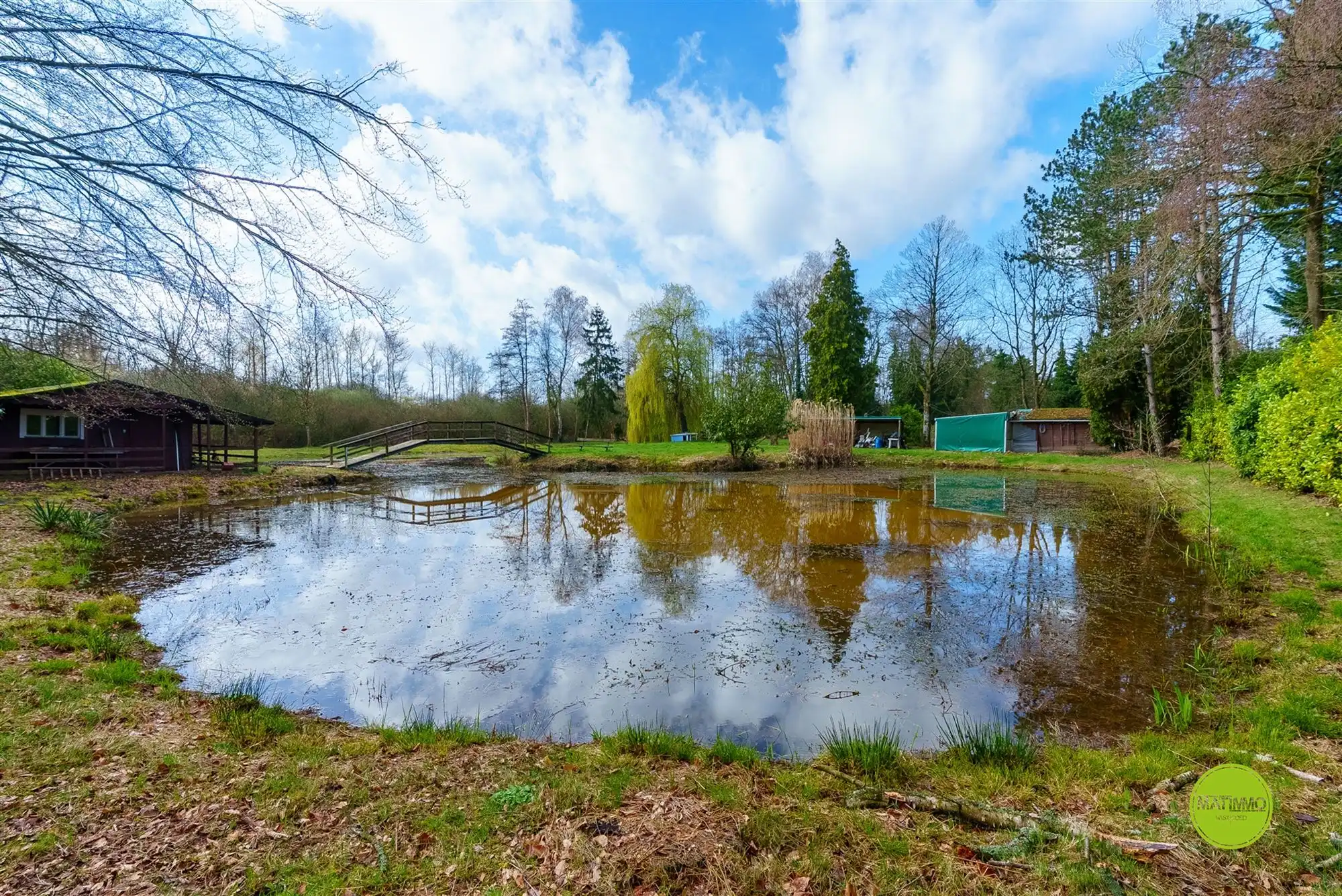 Uniek stukje natuur met twee visvijvers van 6.638 m² foto 10