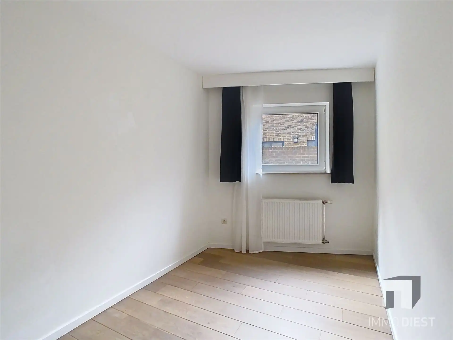 Gelijkvloers appartement met ingesloten koertje foto 9