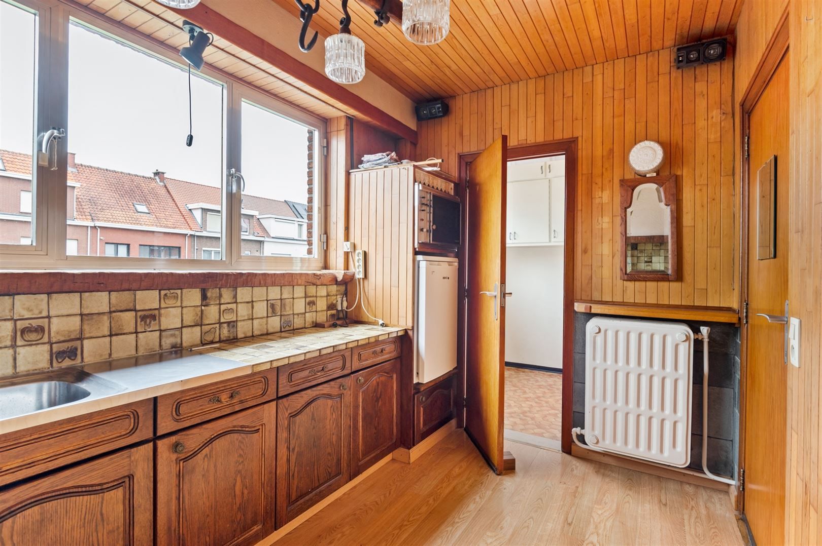 Te renoveren bel-étagewoning met zonnige tuin. foto 7