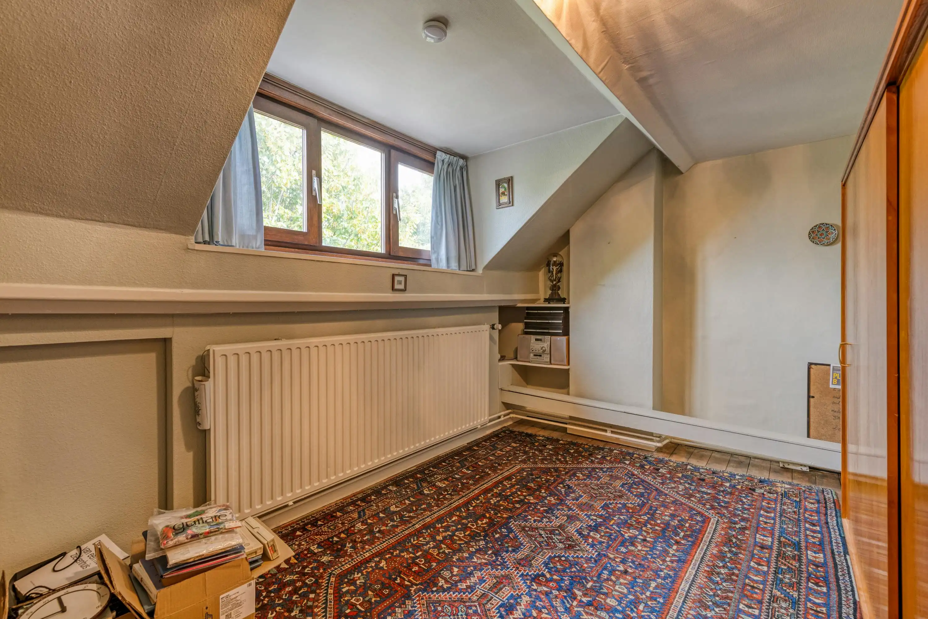 Huis te koop met veel mogelijkheden en tuin te Gentbrugge  foto 17