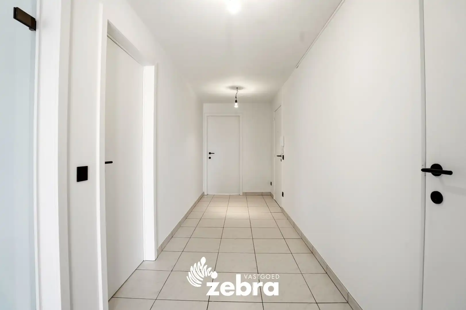 Zeer ruim appartement (137 m²) te koop met dubbele garage in het hartje van Tielt! foto 15