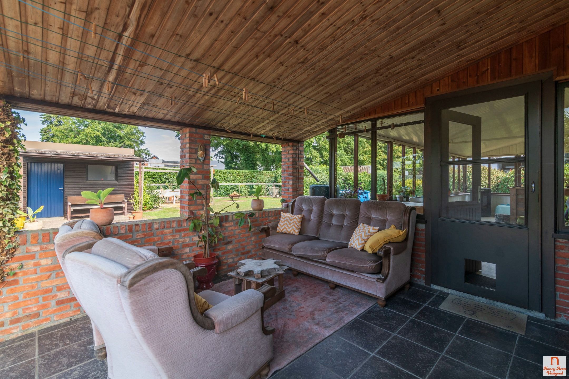 Sfeervolle jaren ’60-woning met grote tuin in rustige straat foto 24