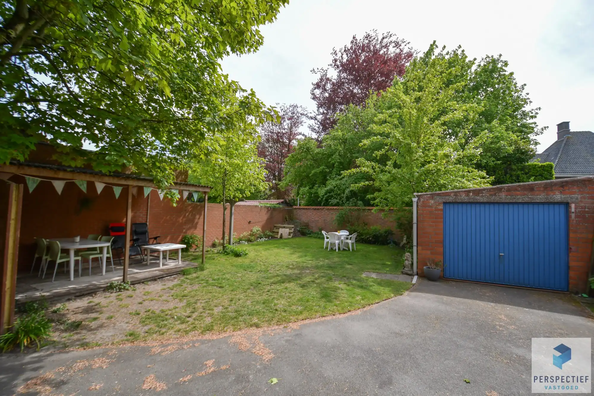 Ruime halfopen bebouwing met tuin en garage in het centrum van Oedelem foto 6