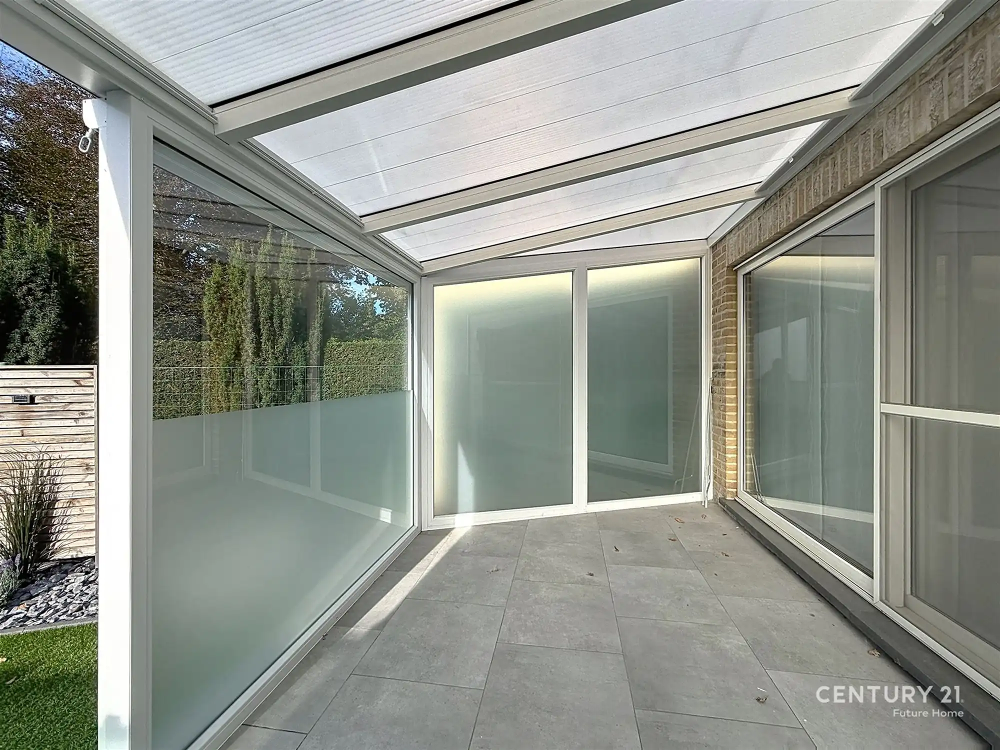 Gelijkvloers appartement met overdekt terras en tuin! foto 13