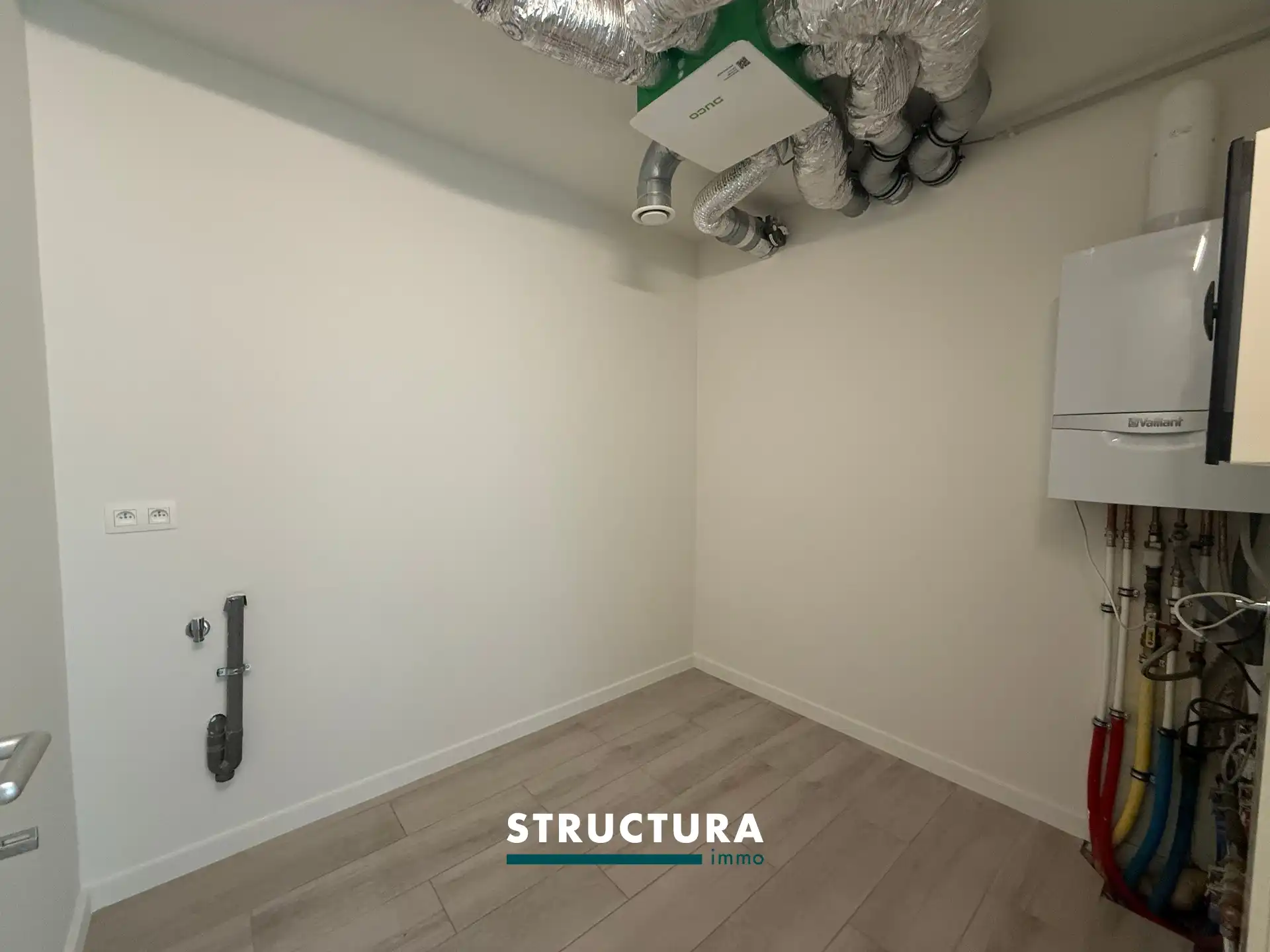 Nieuwbouwappartement met staanplaats en kelder foto 12