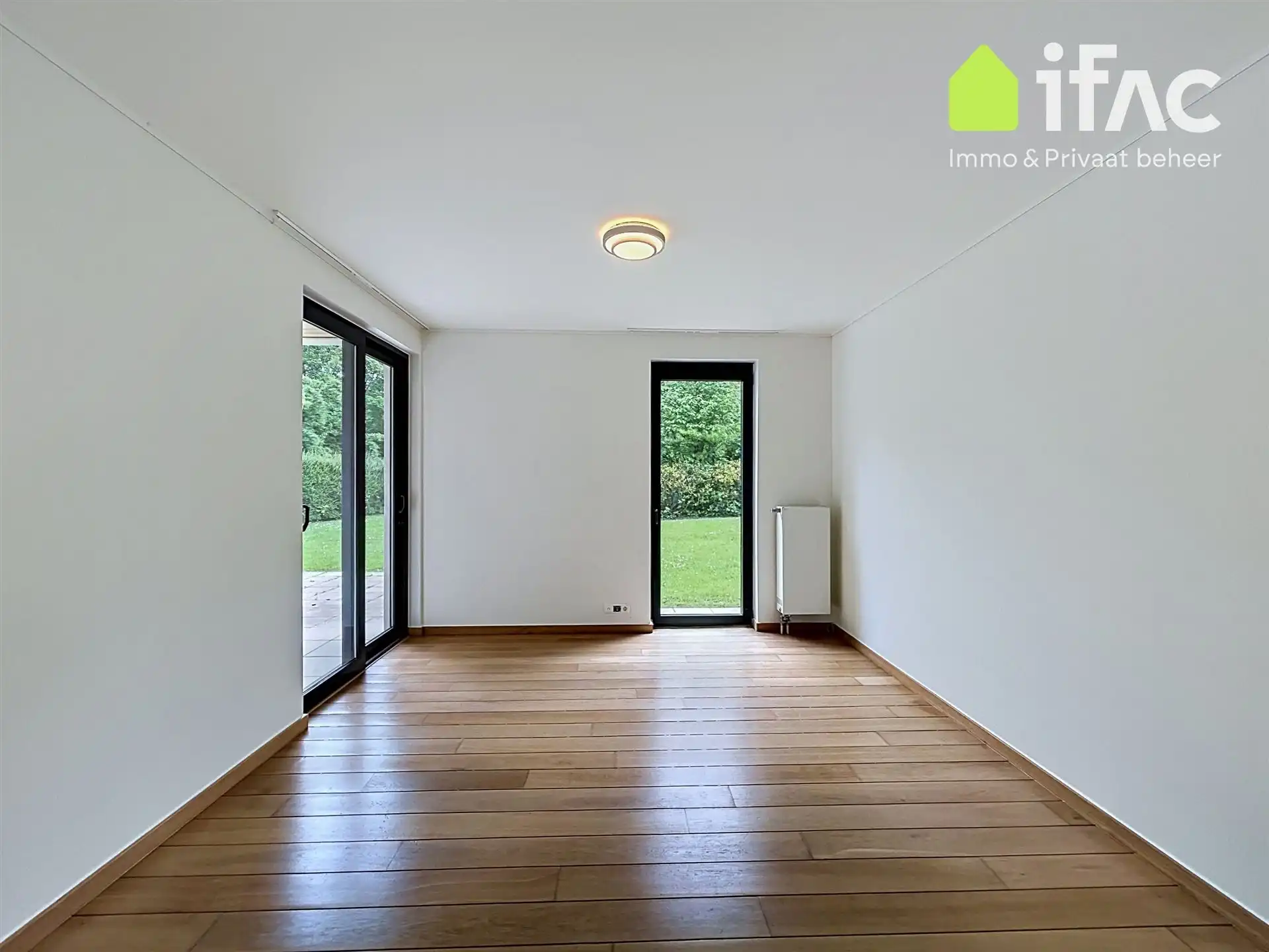 Exclusief gelijkvloers appartement met 2sk en privé tuin foto 14
