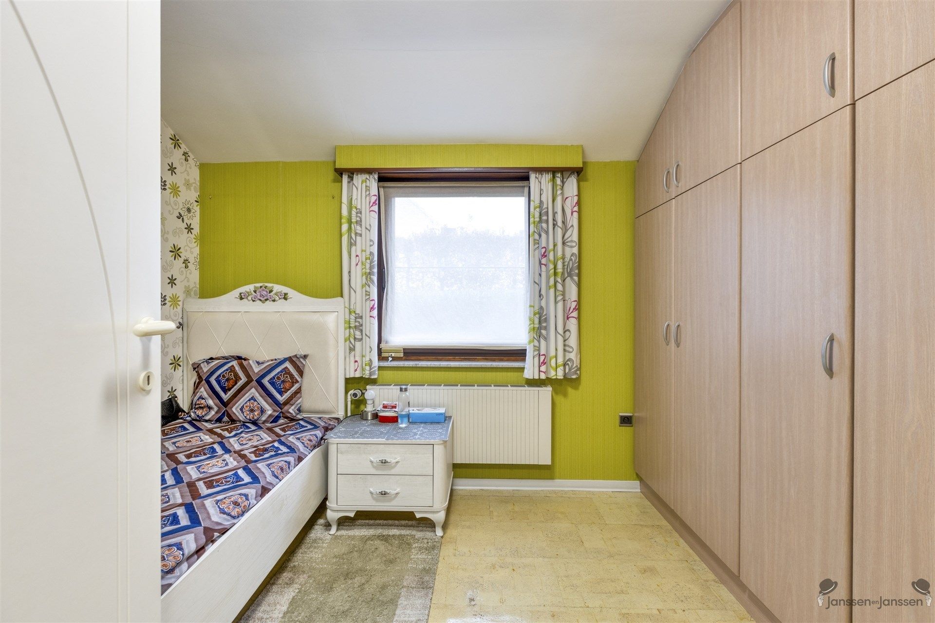 Ruime, goed onderhouden woning met prachtige tuin in Elsum Geel foto 11