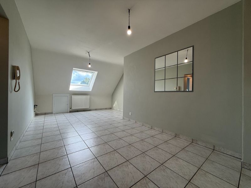 Knus dakappartement te Houthalen. foto {{pictureIndex}}