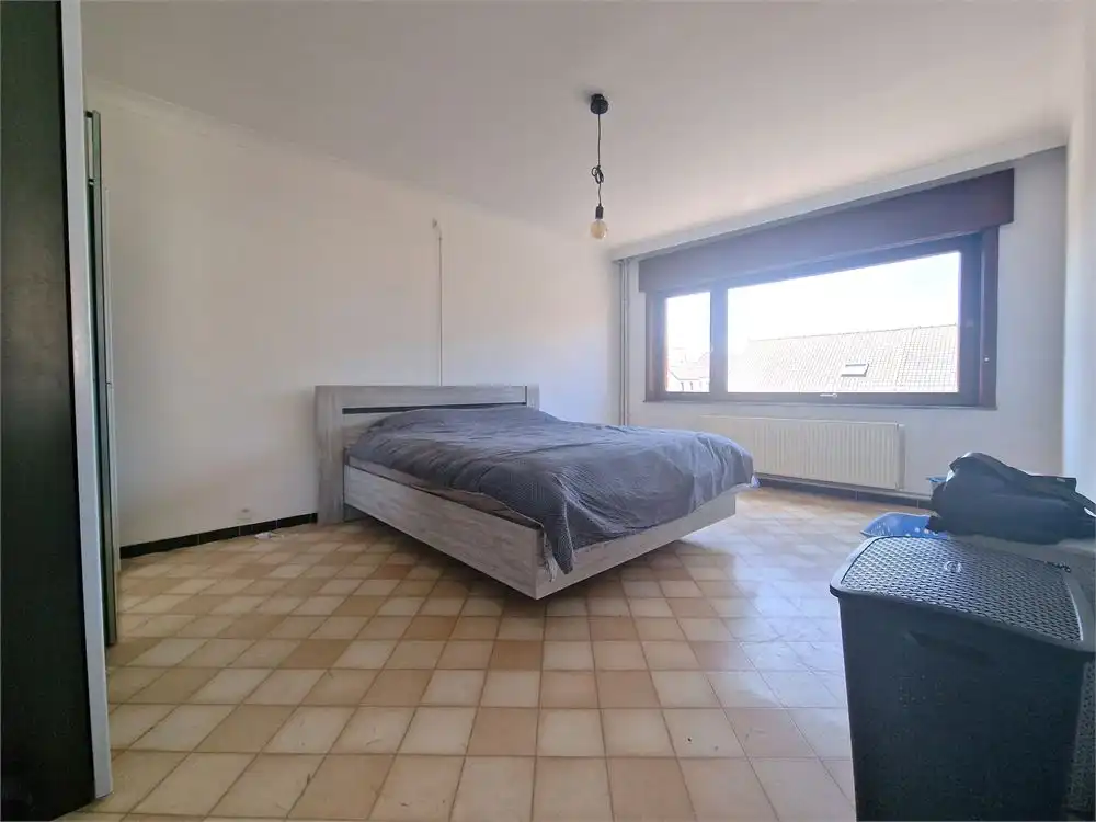 Halfopen te renoveren woning nabij centrum Pittem op een perceel van 348m²! foto 12