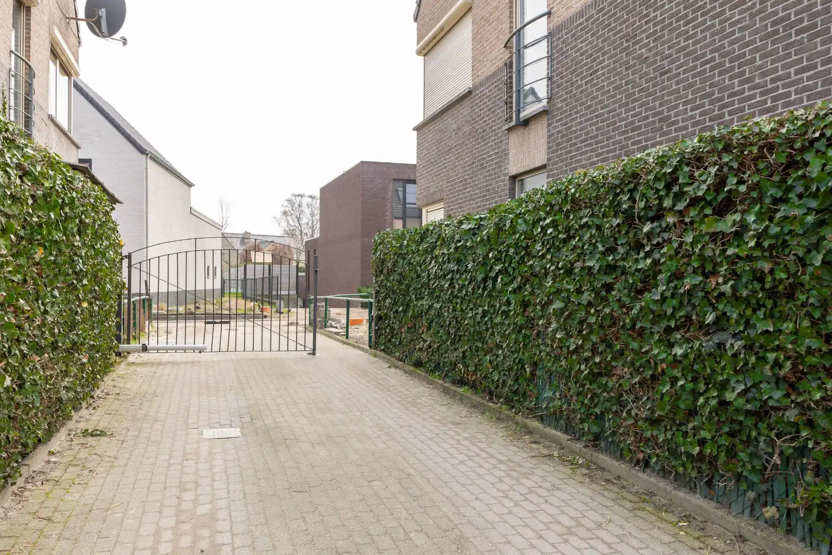 Ruim gelijkvloers appartement met terras en 2 slaapkamers te Overpelt centrum. foto 26