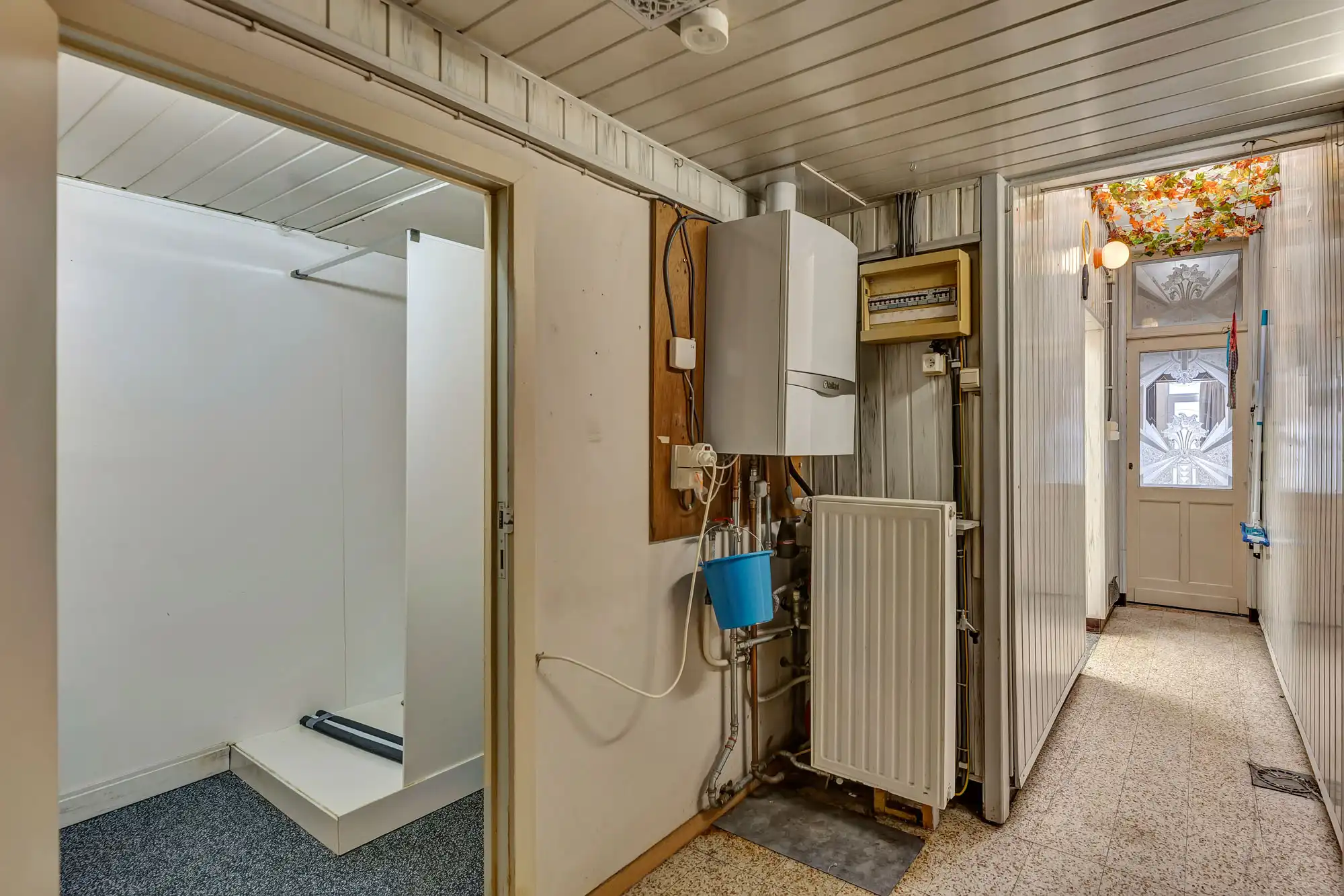 Te renoveren rijwoning met tuin foto 9