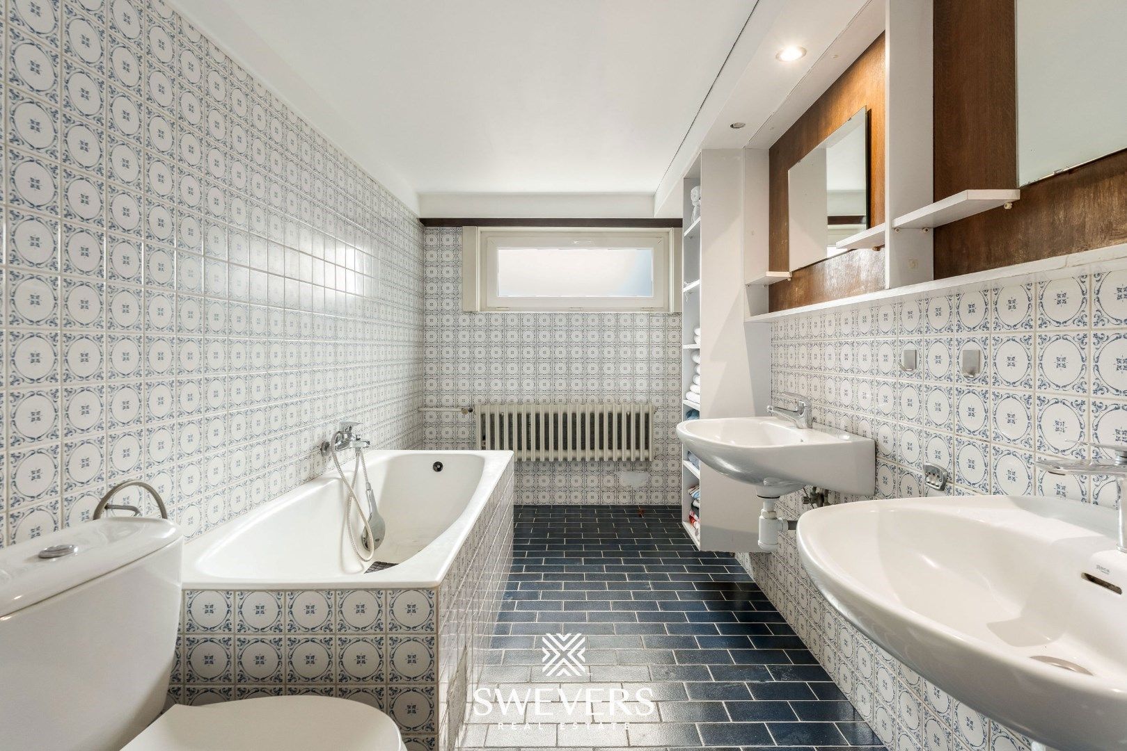 Gezinswoning met verrassend veel ruimte: vijf slaapkamers, kelderverdieping en loods foto 17