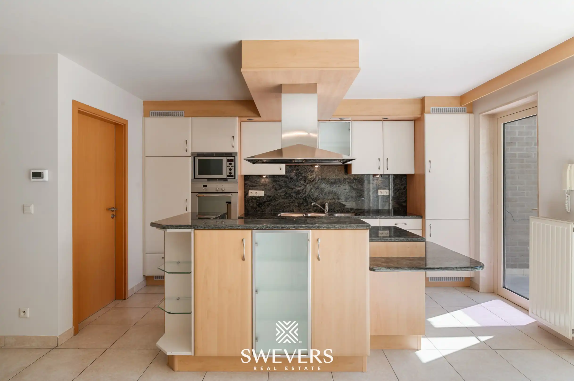 Gelijkvloers appartement met twee slaapkamers, ruime veranda en terras te Bree foto 8