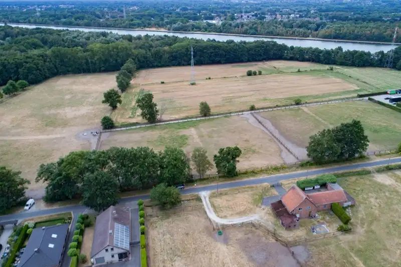 Bouwgrond van 10 aren op unieke locatie, volledig groen omgeven foto 5