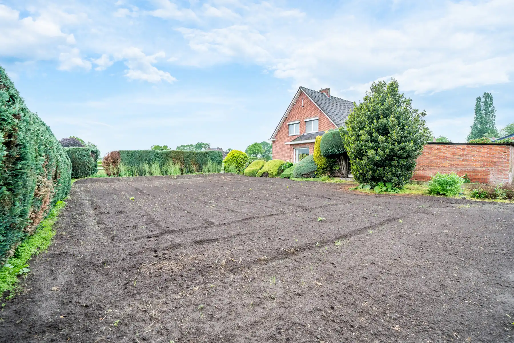 Karaktervolle jaren ’60 gezinswoning met een uitzonderlijk breed perceel (37m) en eindeloos potentieel op een toplocatie in Geel! foto 17
