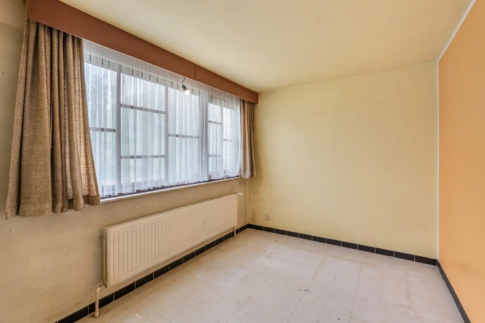 Karaktervolle patio-bungalow met renovatiepotentieel in doodlopende straat te Herent foto 7