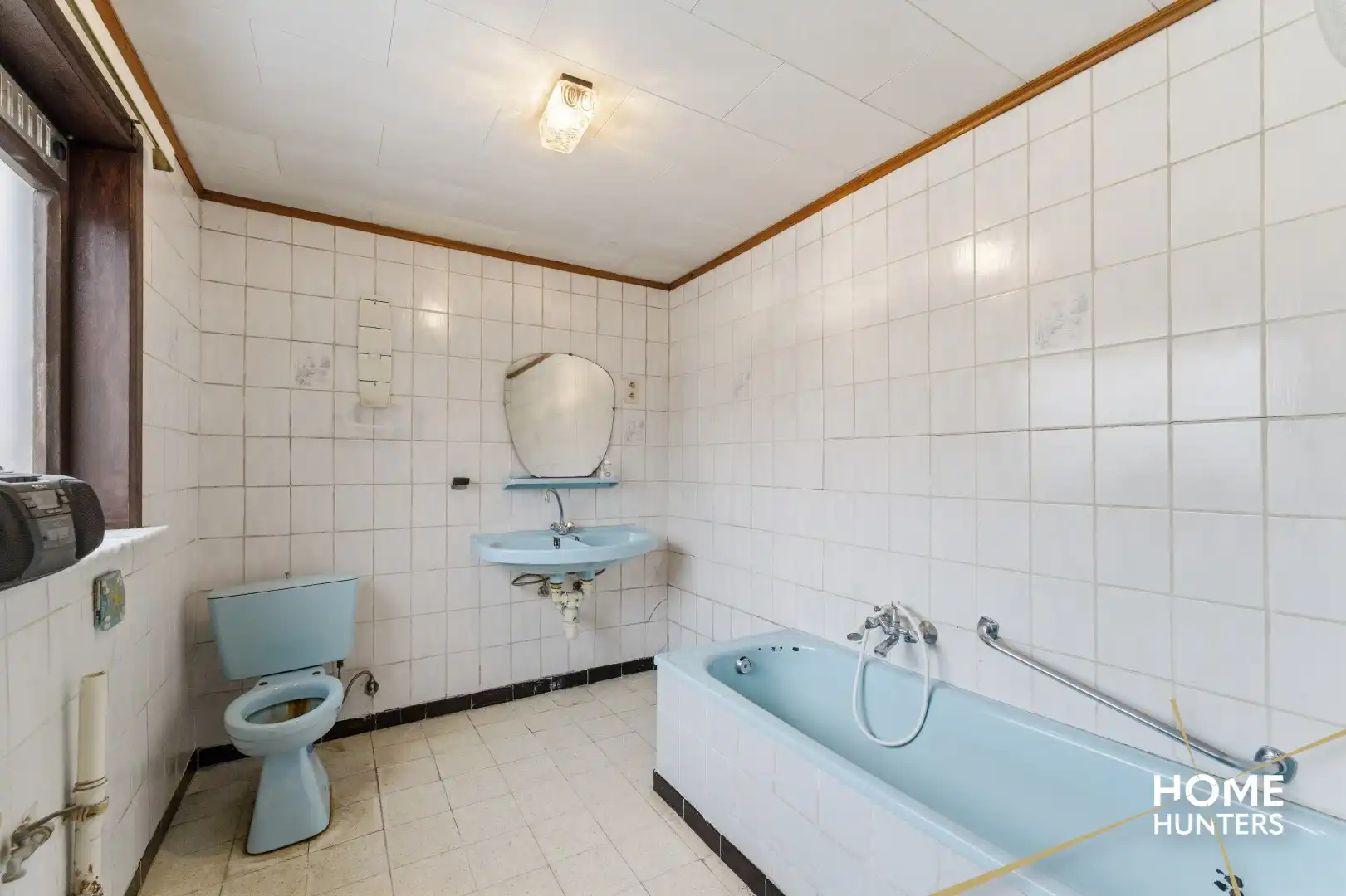 Te renoveren woning met garage en bijgebouw in hartje Poelkapelle! foto 7