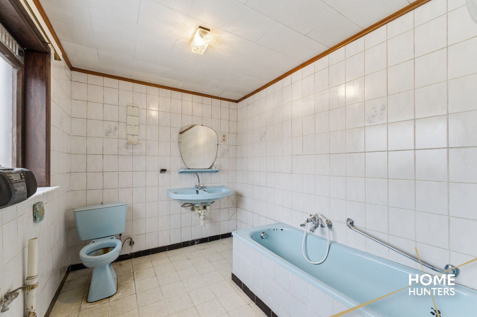 Te renoveren woning met garage en bijgebouw in hartje Poelkapelle! foto 7