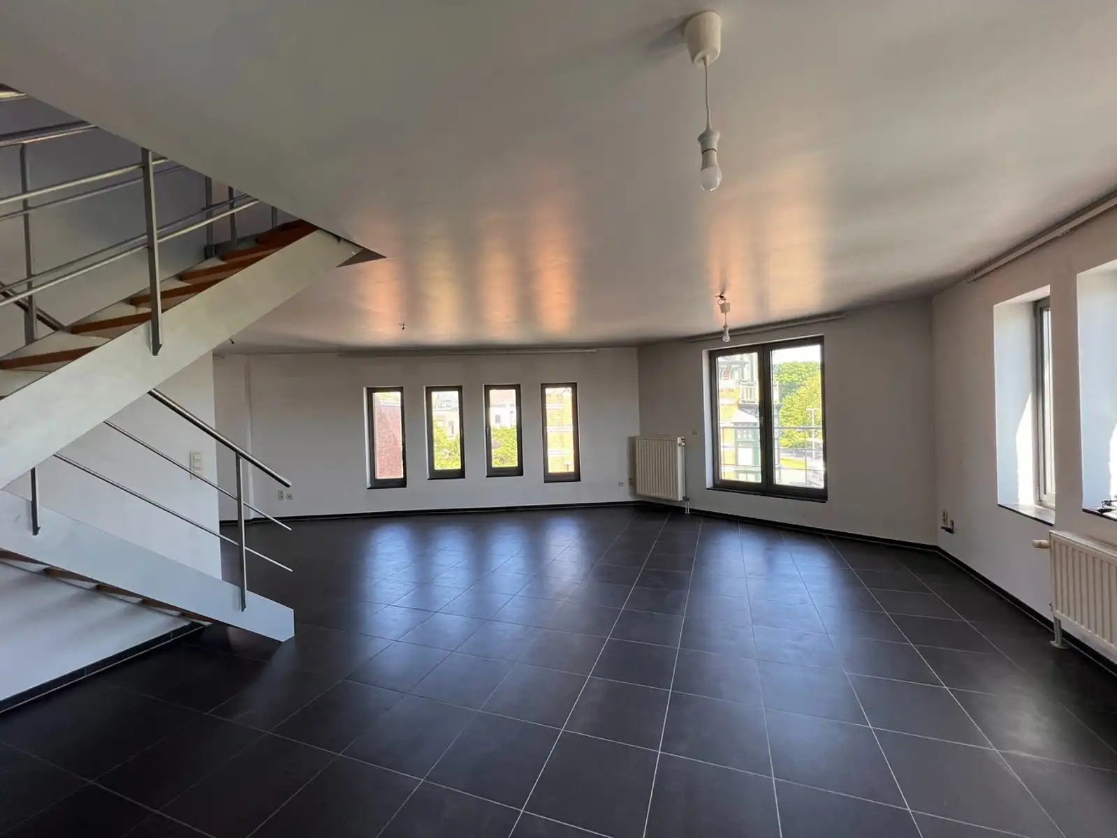 Ruim 2 slaapkamer duplex appartement te huur in Leuven foto 4
