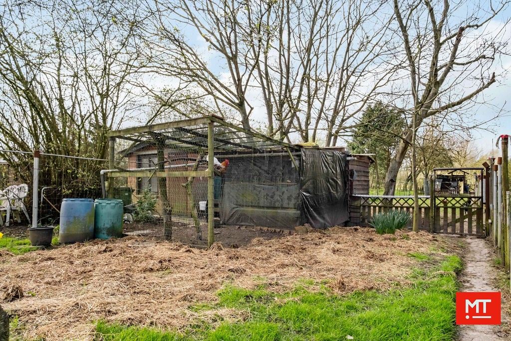 Instapklare woning met 3 slaapkamers en tuin op 884 m² in Vlamertinge foto 15