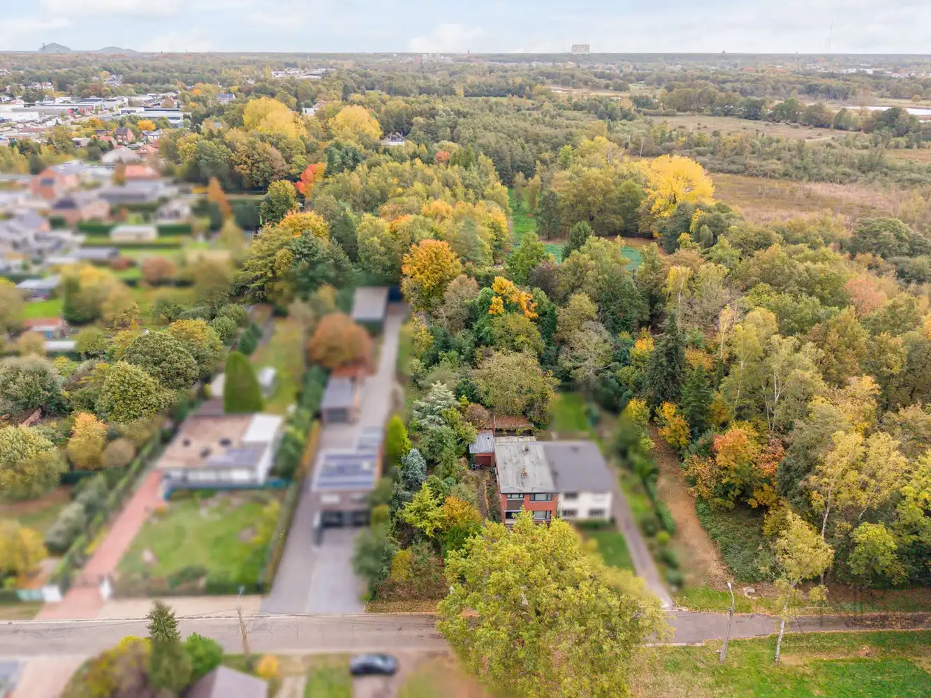 Woning met  bouwgrond te koop aan De Maten in Genk foto 3